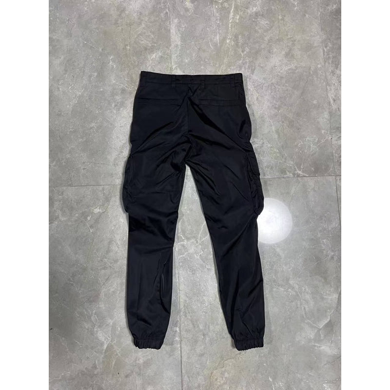 Prada 尼龍鐵牌縮口長褲